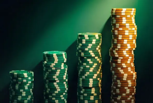 Casino chips stacking exponentially, representing the Martingale betting system's dangerous growth pattern